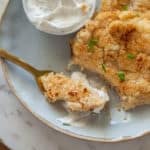 These potato cakes with sour cream dressing are the perfect way to use leftover mashed potatoes. They are great as breakfast or as a dinner side.