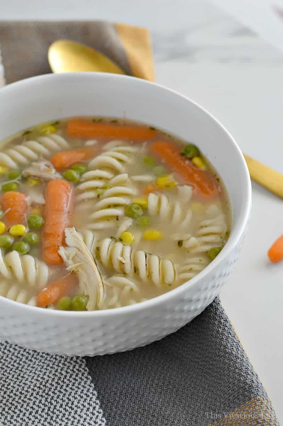 This gluten-free chicken noodle soup is the best recipe around. It is homemade and oh so delicious! | gluten-free soup recipes | easy gluten-free soup recipes | homemade soup recipes | healthy chicken noodle soup | easy chicken noodle soup || This Vivacious Life #glutenfreesoup #chickennoodlesoup #souprecipes
