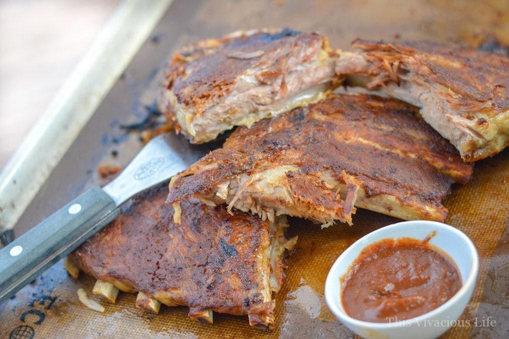 Ribs on a platter with bbq sauce
