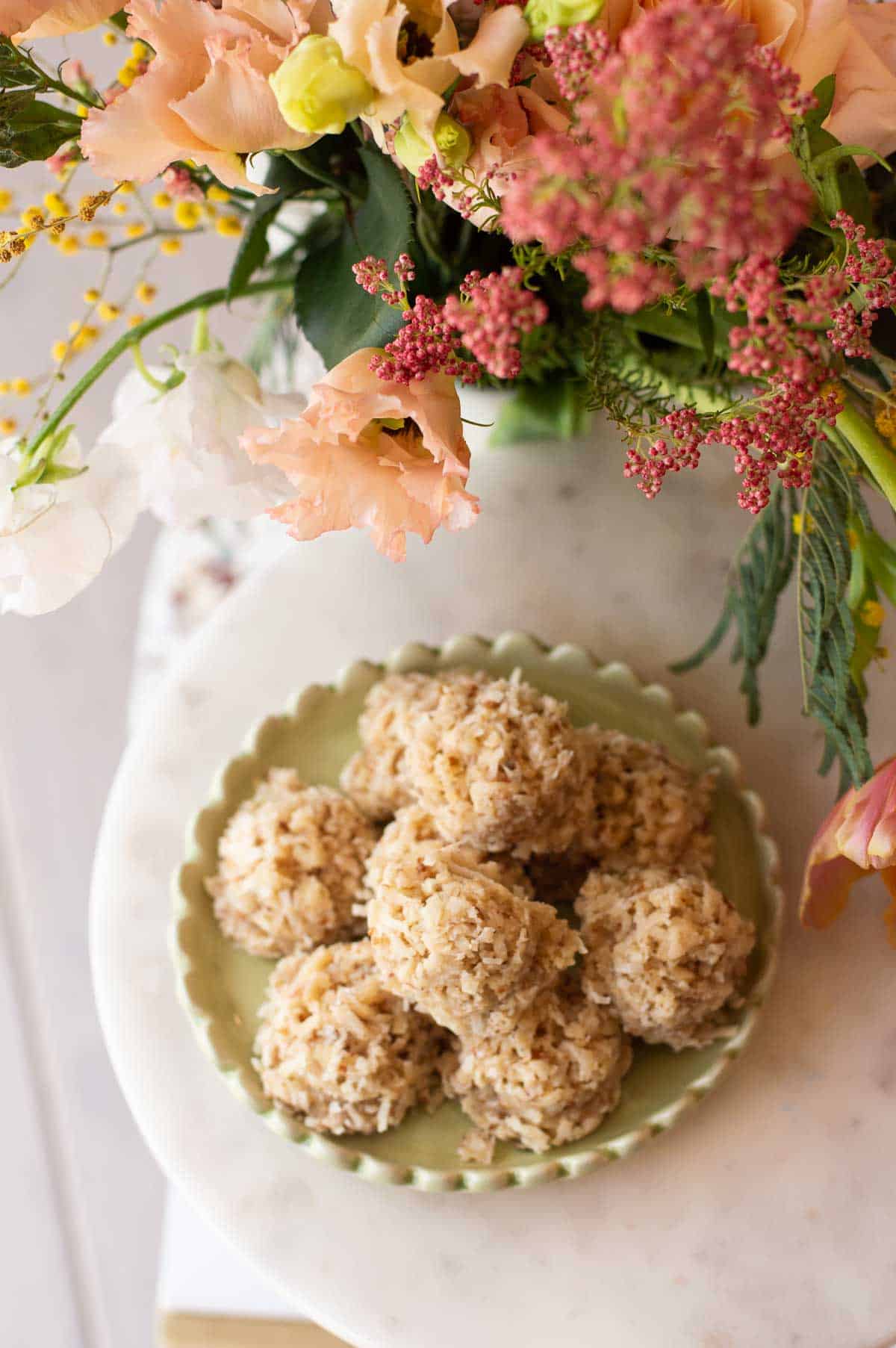 coconut macaroons on a green plate