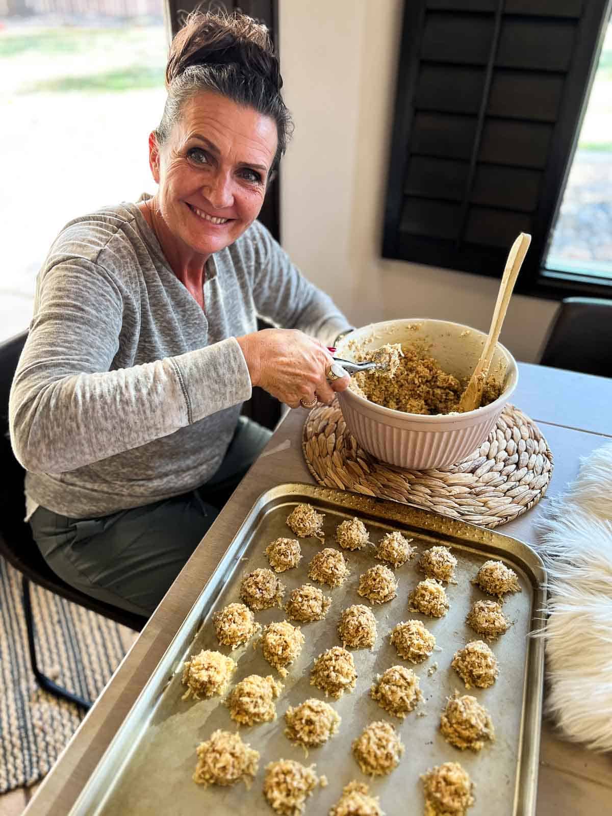 woman making coconut macaroons