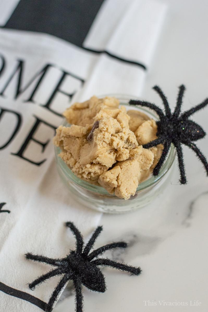 Spider cookie dough with black toy spiders