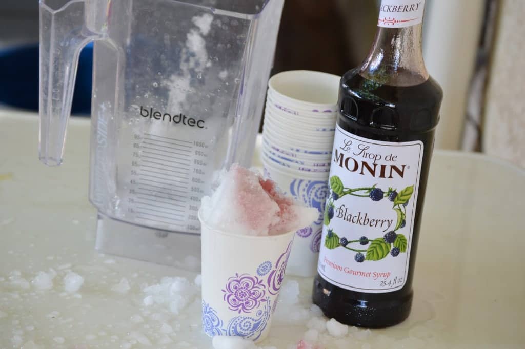 Homemade snow cones with blackberry syrup