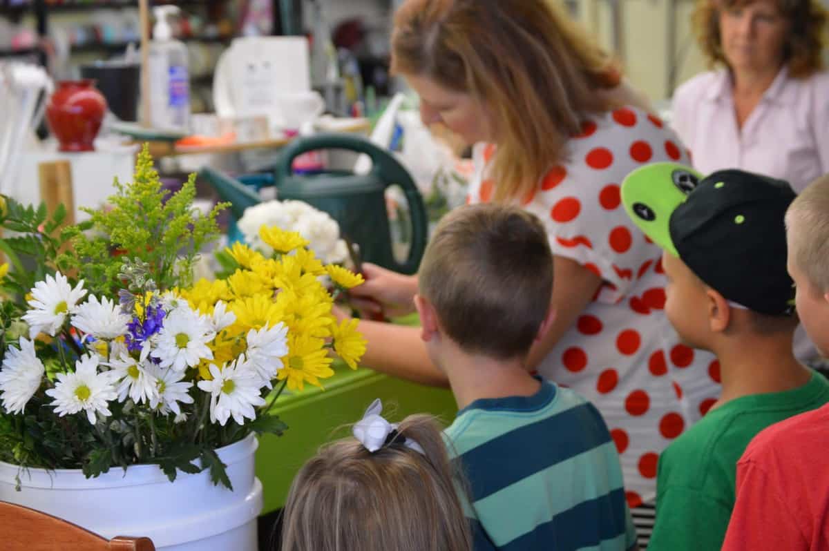 Kids at a flower shop