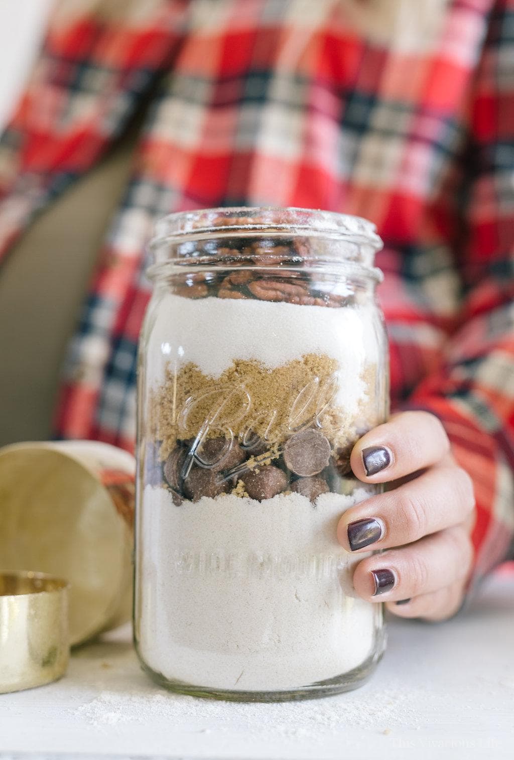 Front shot of chocolate chip cookies in a jar