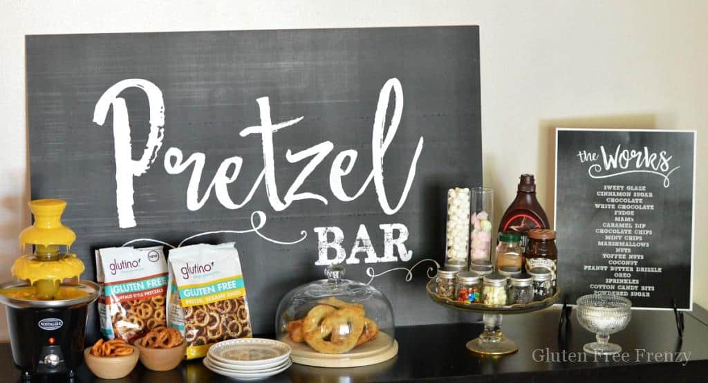 Pretzel Bar Party that you can easily put together! Such fun elements like a nacho cheese fountain, giant inflatable pretzel and cute signs. www.glutenfreefrenzy.com