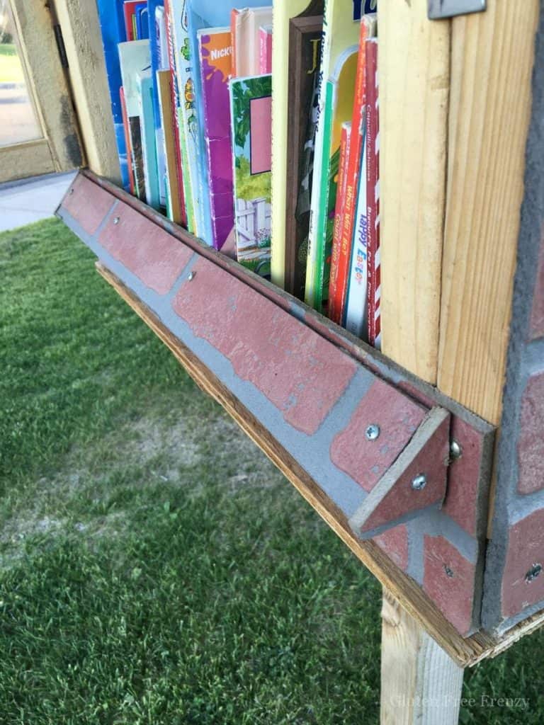 This DIY little library is so cute and totally promotes childhood literacy in neighborhoods. Get measurements and more on how to build your own little lending library. Plus, see all the gorgeous pictures from the adventure awaits little lending library party!