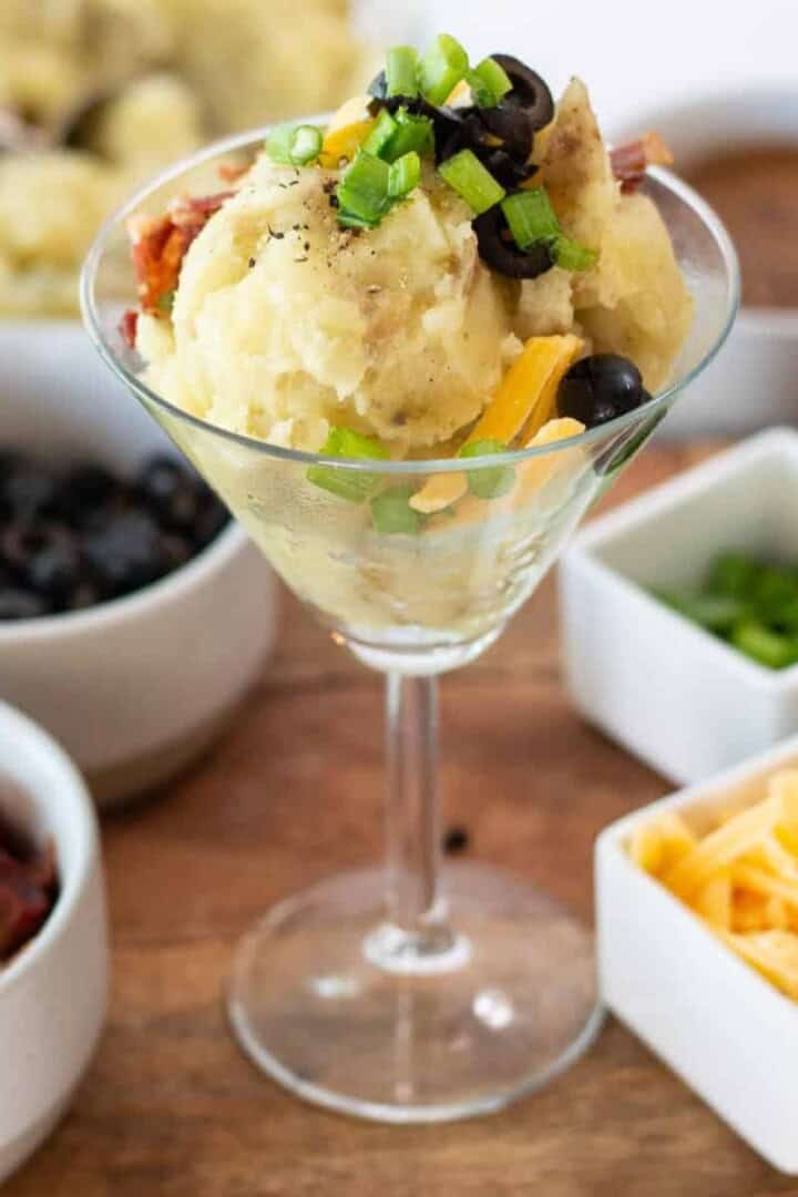 mashed potatoes in a martini glass with toppings