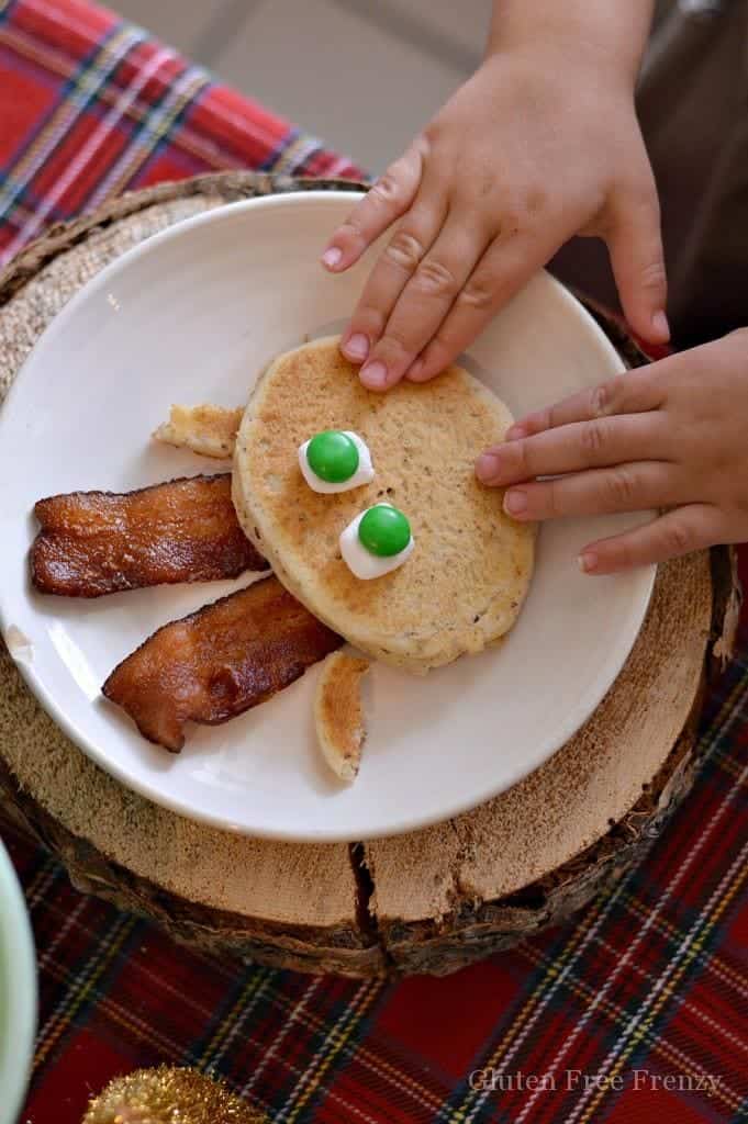 This gluten-free mini reindeer pancake party is both whimsical and tasty. Kids will love how tiny and tasty everything is at this holiday breakfast. | gluten-free Christmas recipes | kid-friendly Christmas parties | kid-friendly holiday parties | Christmas party theme ideas | reindeer themed recipes | Christmas themed breakfast recipes || This Vivacious Life #reindeer #kidfriendlyfood #christmasparty #ChristmasBreakfast 