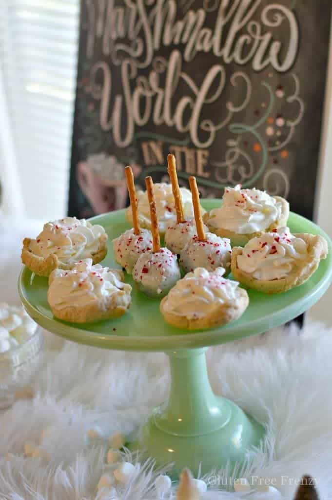 This marshmallow Christmas party is full of sweet treats and a full tablescape. From white bottlebrush trees to a fluffy white cloth, you will truly feel like you are walking through a marshmallow world. glutenfreefrenzy.com