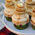 These pancake cupcakes at a flannel and flapjacks holiday party are delicious and the party is full of rustic holiday fun! From the pancake decorated sugar cookies, gingerbread pancakes with sugared cranberries and flannel pj gift exchange, it has all the makings of a great holiday or Christmas girls party.