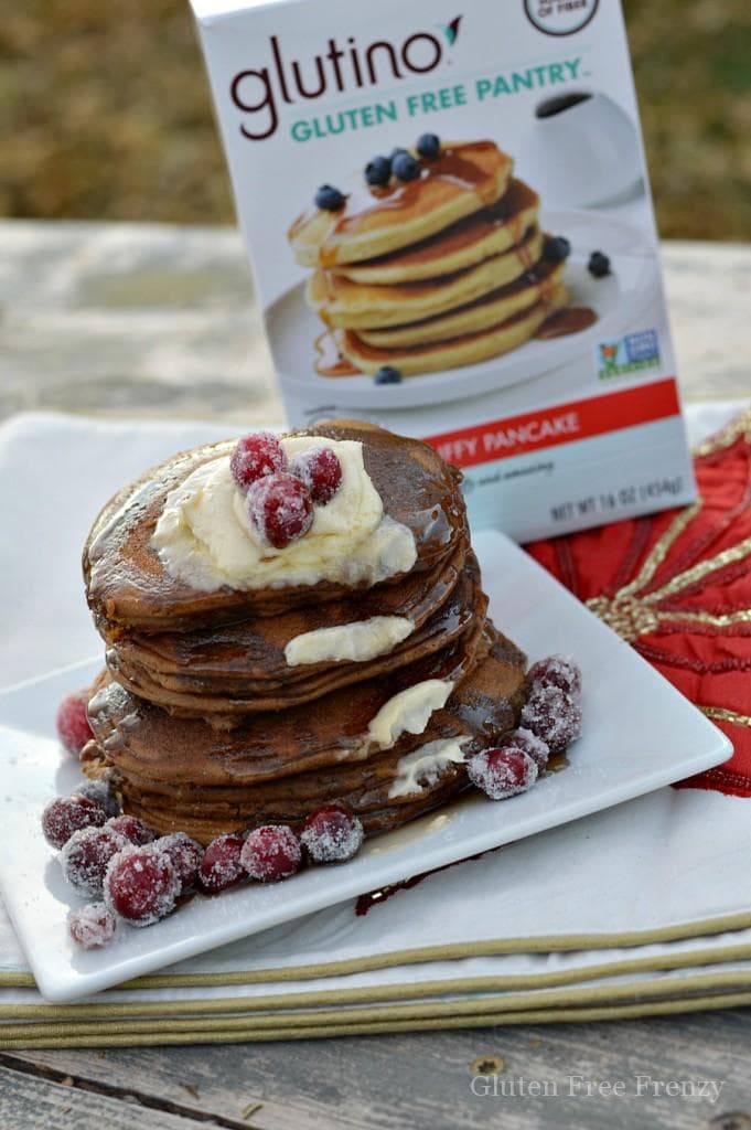 Oh holly jolly, these gluten-free gingerbread pancakes are full of holiday flavors and spices. They are so delicious nobody would ever know they are gluten-free. Serve them with sugared cranberries on top.