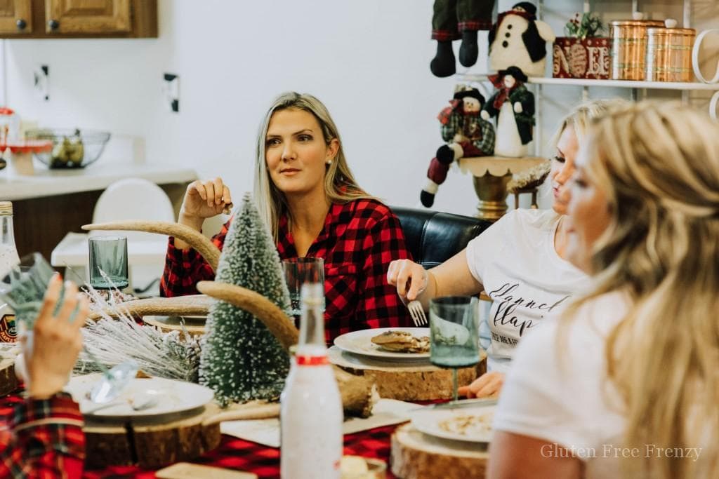 This flannel and flapjacks holiday party is full of rustic holiday fun! From the pancake decorated sugar cookies, gingerbread pancakes with sugared cranberries and flannel pj gift exchange, it has all the makings of a great holiday or Christmas girls party. | holiday party ideas | holiday party food | fun holiday parties | christmas parties | holiday parties for adults | themed holiday parties | christmas parties for adults || This Vivacious Life #holidayparties #christmaspartyideas