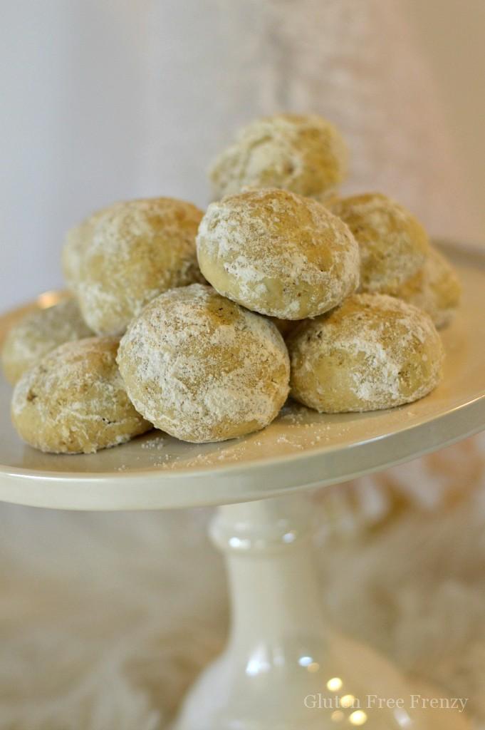 Our gluten-free snowball cookies are a fun way to get into the holiday spirit. They are simple, delicious and full of powdery white sugar. | gluten-free holiday cookies | gluten-free christmas cookies | gluten-free cookies | gluten-free holiday recipes | gluten-free holiday treats | gluten-free holiday desserts || This Vivacious Life #snowballcookies #glutenfreechristmas #glutenfreecookies