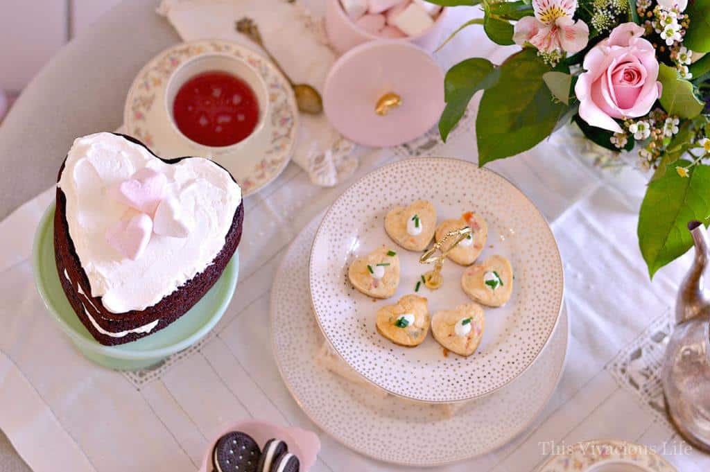 This vintage Valentines tea party was full of classy florals, antique china and delicious gluten-free goodies including savory crab cheesecakes. Get the recipe and all the details at thisvivaciouslife.com.