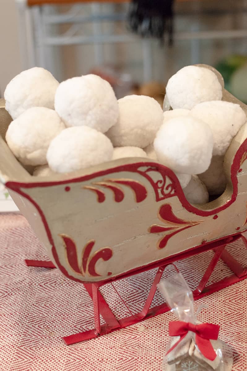 Cotton snowballs in a silver and red sleigh