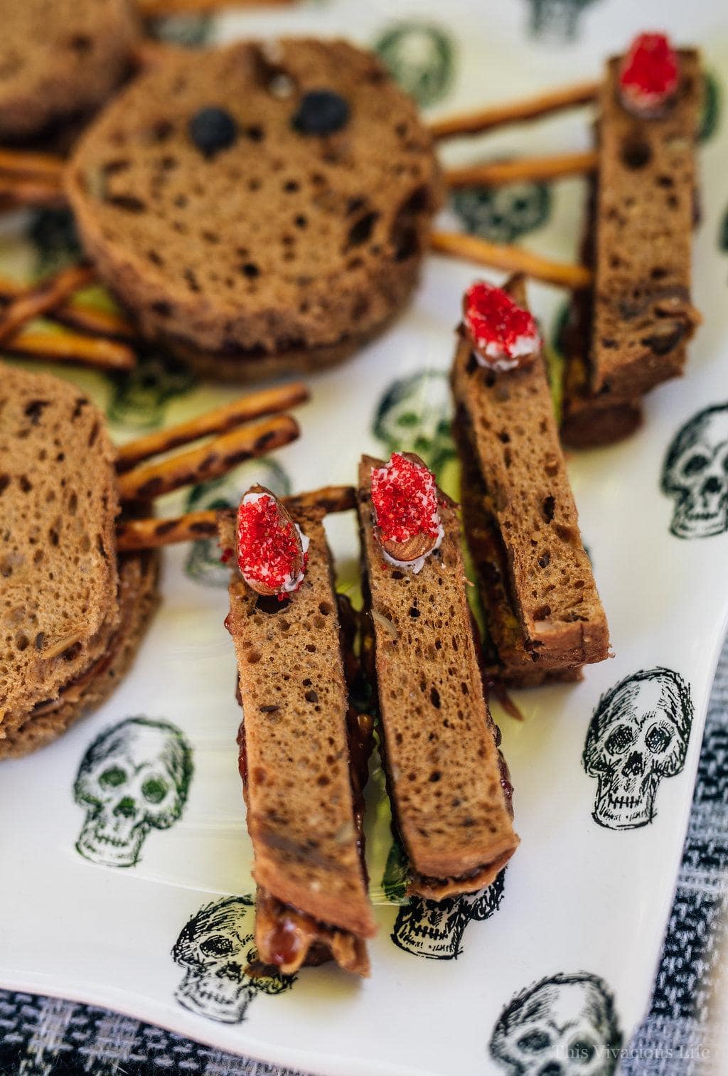 This spooky sandwich bar Halloween party is such a fun one especially for little ones. They will love the variety of fun sandwiches and eerie decor. | fun halloween ideas for kids | halloween party ideas | halloween recipe ideas | fun halloween food for kids | kid-friendly halloween recipes | halloween recipes for kids | spooky recipe ideas || This Vivacious Life #halloween #spooky #glutenfree #glutenfreehalloween #sandwiches #kidfriendly #halloweenparty #kidshalloween #thisvivaciouslife