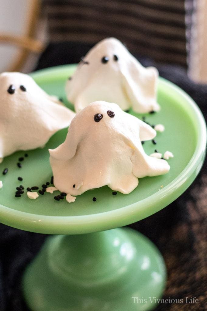 No-bake ghost cookies on a jadeite cake stand