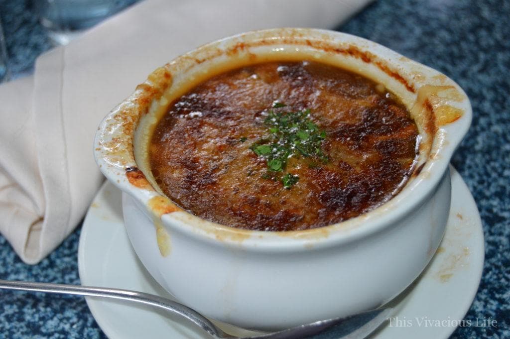Disneyland French onion soup in a white bowl