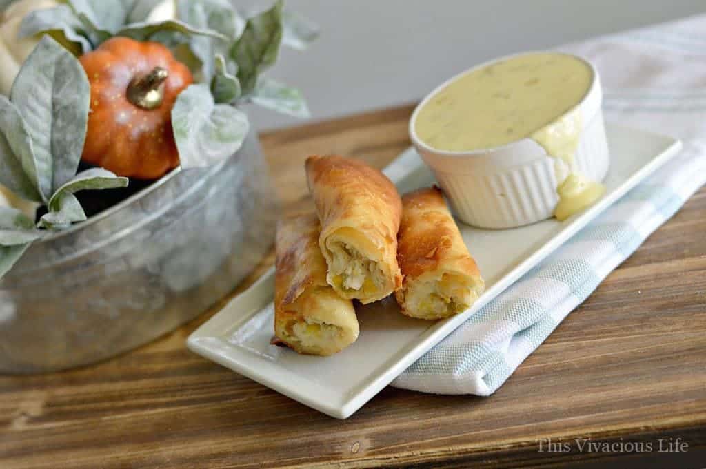 These gluten-free turkey, corn and cream cheese flautas with spicy white queso is the perfect Thanksgiving leftover meal.