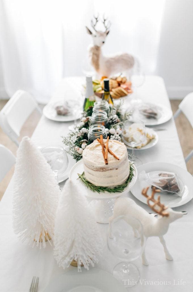 You guys are going to love this white Christmas dinner party and gluten-free eggnog cake! From the menu to the decor we kept it simple and sleek.
