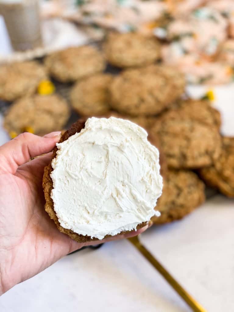 Gluten-Free Oatmeal Cream Pies icing smeared on one side of the cookie