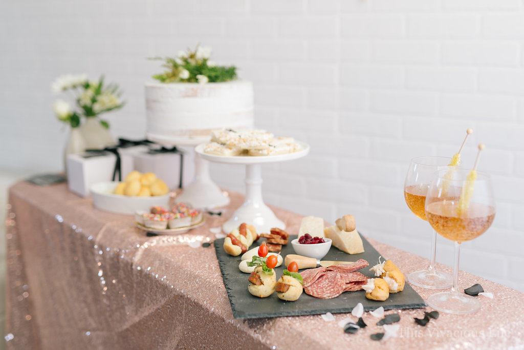 This clean slate New Years Eve party is bright and fun with a touch a slate black beauty. There are lots of delicious appetizers and goodies plus some beautiful clean slate resolutions cards for guests to write on. Everyone will go home with some midnight snack boxes as well. 