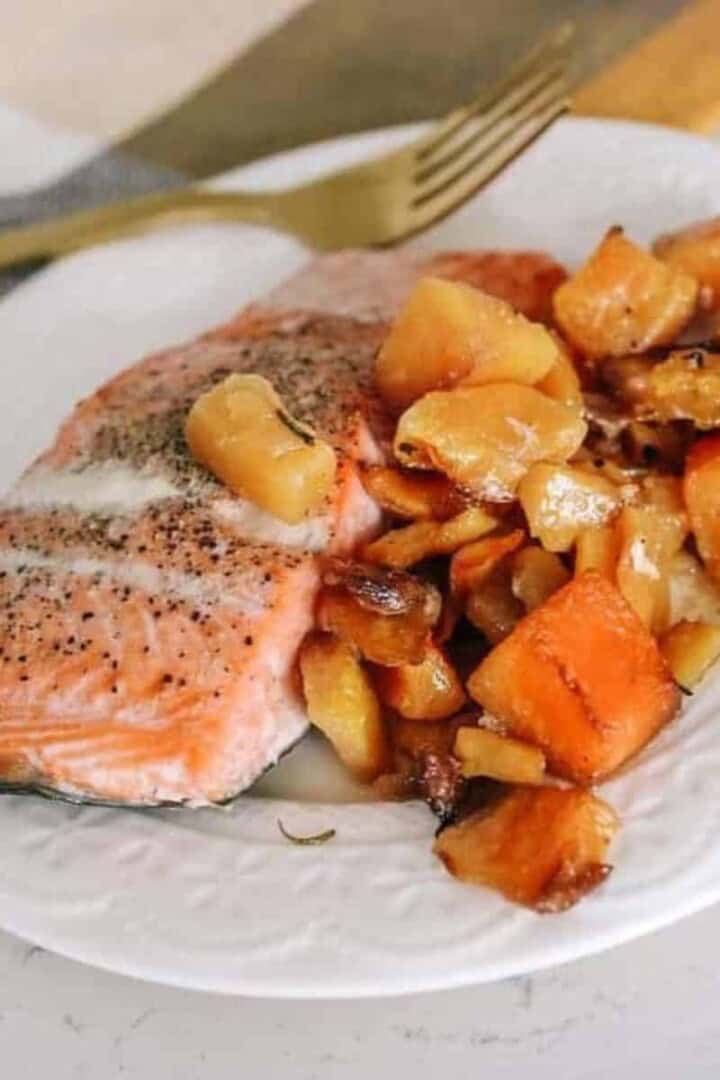 Sheet Pan Salmon and Veggies on a white plate