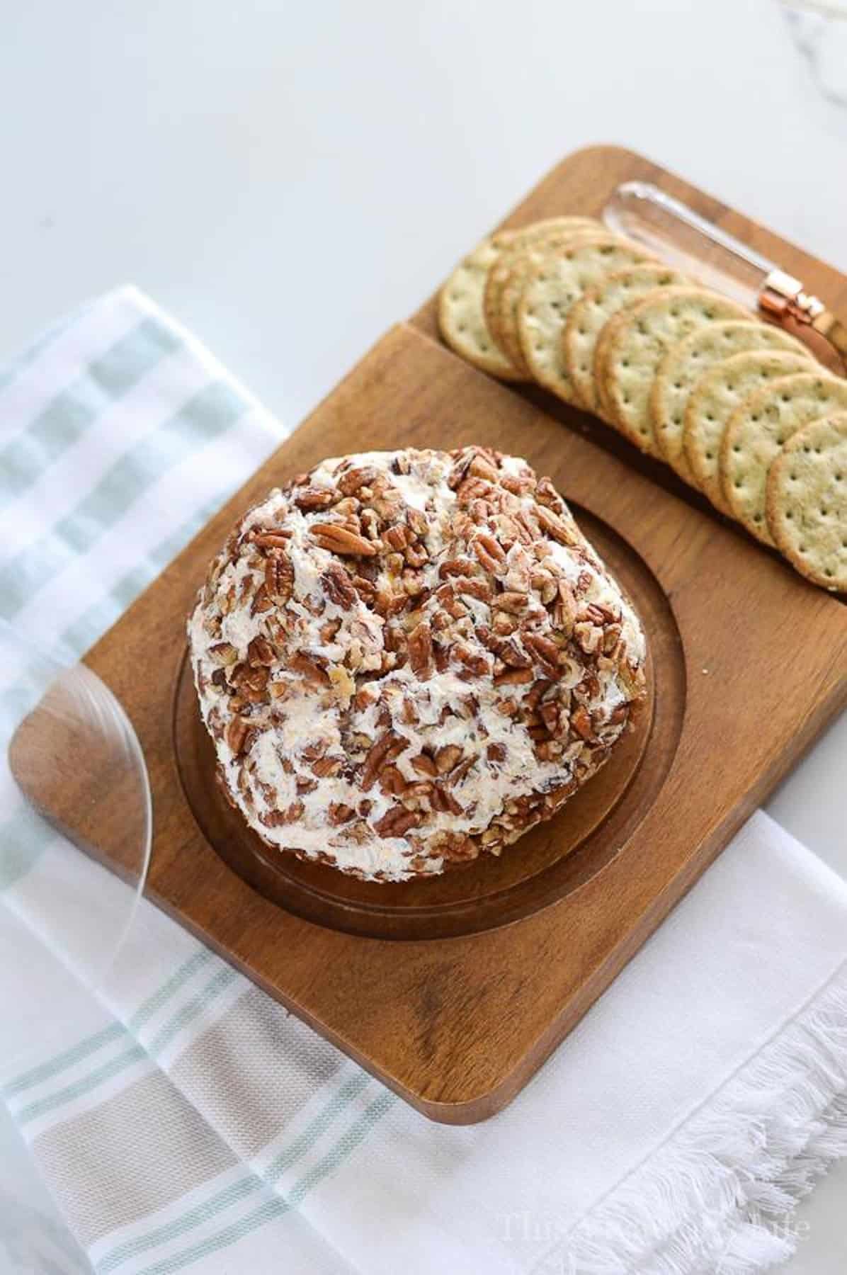 BEST cheeseball on wood platter with crackers