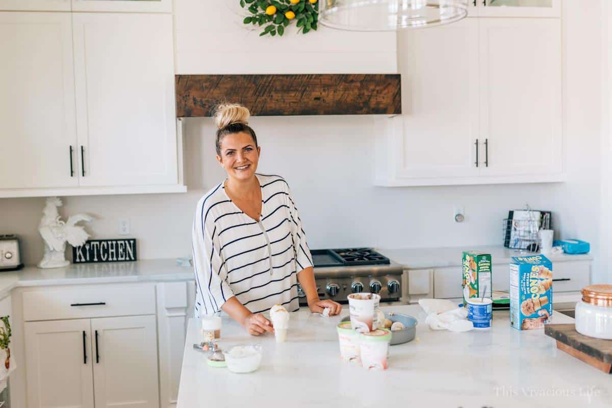 Girl in a kitchen with ice cream cake pops