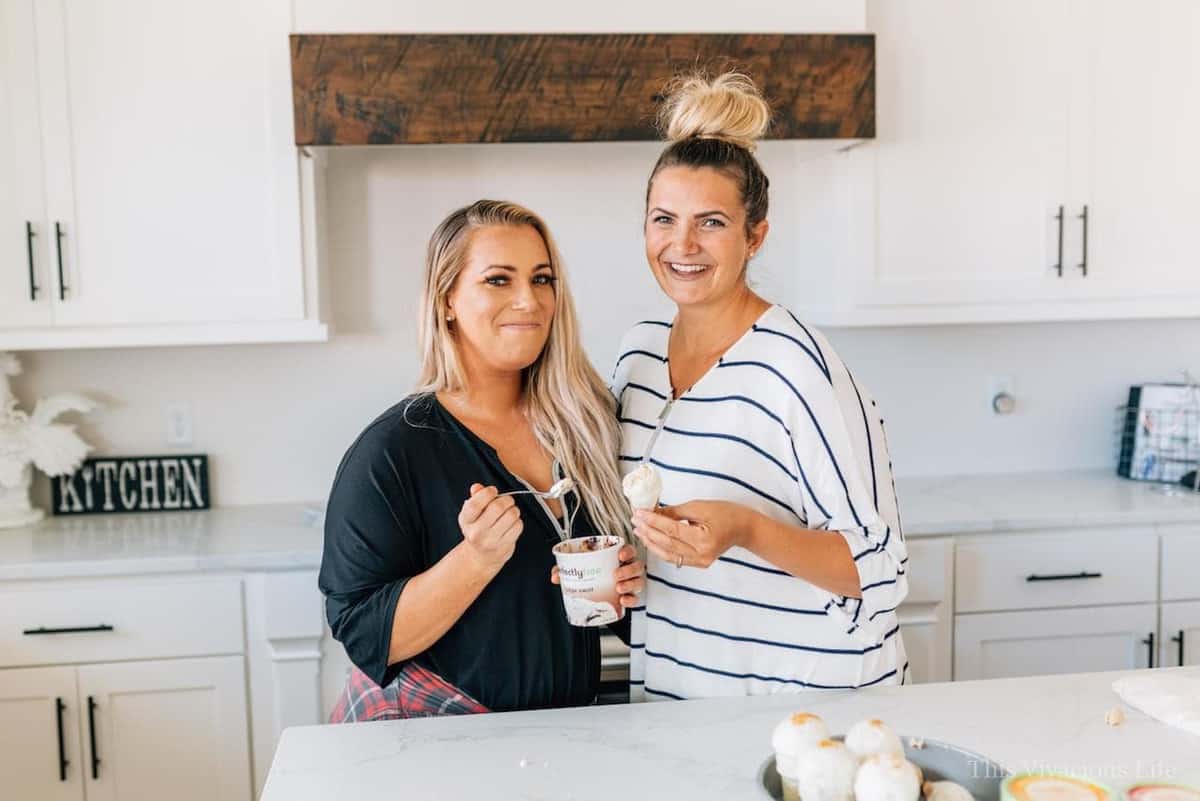 Sisters eating ice cream and ice cream cake pops