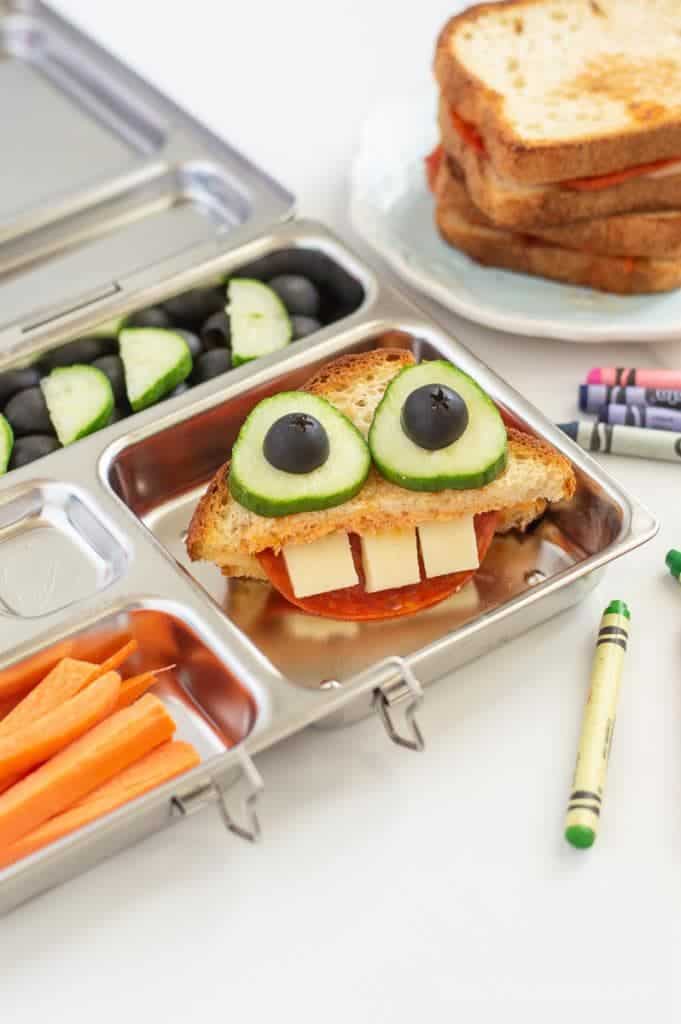 This pizza grilled cheese monster is going to be any kids favorite lunchbox sandwich! They are going to love the whimsy and fun of opening this up in the lunchroom to a funny face. We love using Canyon Bakehouse bread because it is so tasty that nobody would ever know it is gluten-free. AD | lunchbox ideas for kids | fun lunches for kids | sandwich ideas for kids || This Vivacious Life #lunchbox #sandwiches #kidfriendly #backtoschool #lunches #thisvivaciouslife