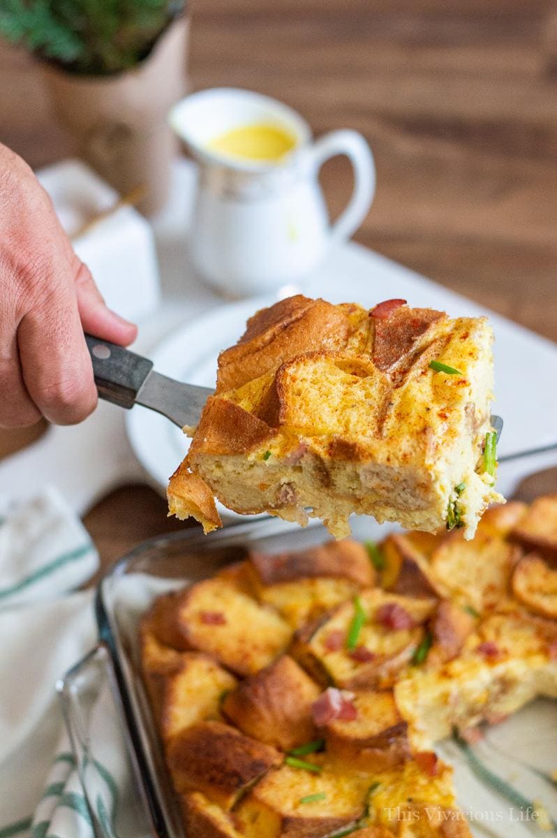 Gluten-free eggs benedict casserole with smoky hollandaise sauce! This overnight breakfast casserole is so fluffy and delicious as well as rich in flavor. Everyone will love it whether gluten-free or not. The Canyon Bakehouse gluten-free English muffins really make this dish special. AD || This Vivacious Life #glutenfree #recipe #eggsbenedict #casserole #breakfast #breakfastrecipe #glutenfreerecipes #thisvivaciouslife