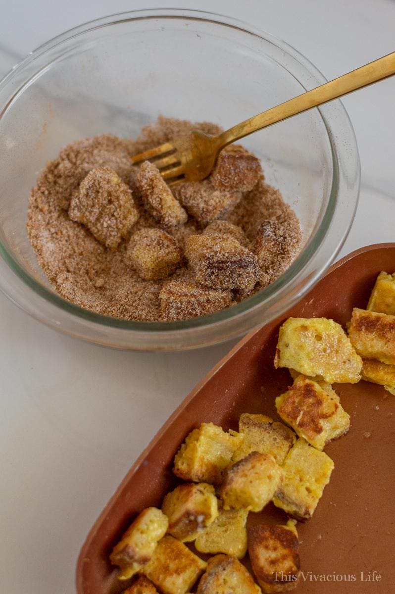 French toast bites in cinnamon sugar and some in a frying pan