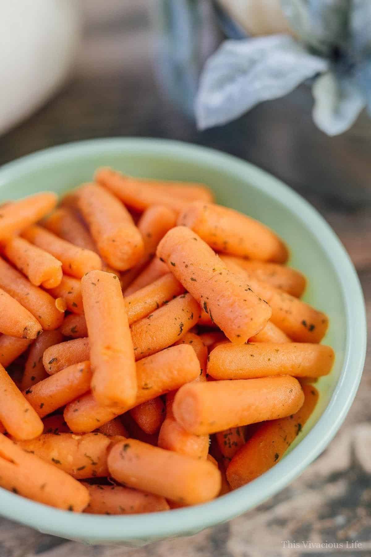 Buttered carrots in a jadeite bowl