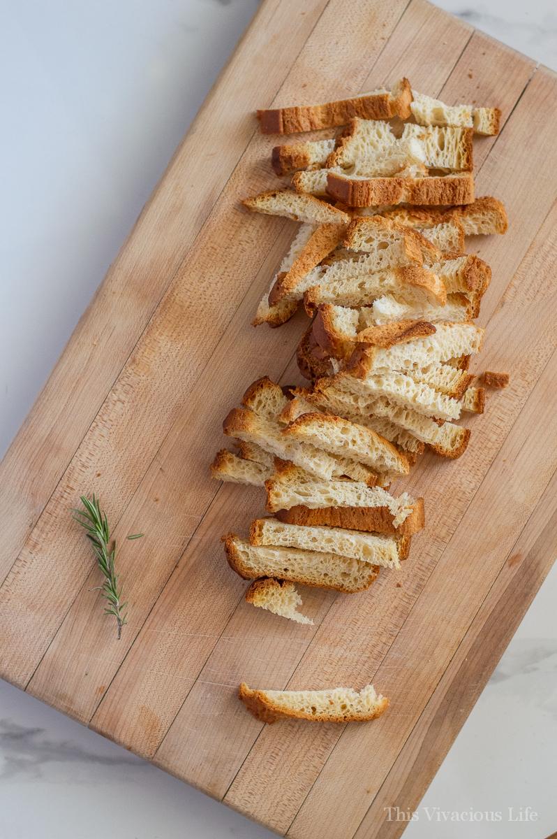 gluten-free bread sliced on a wood cutting board