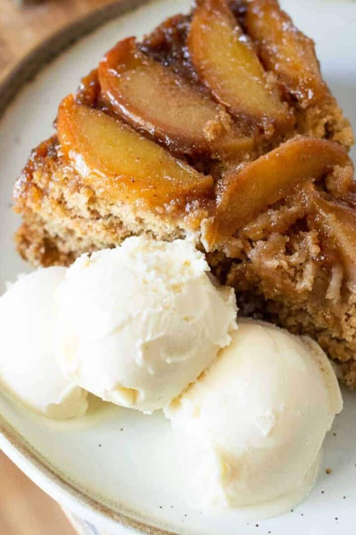Gluten Free Apple Cake with ice cream on a plate