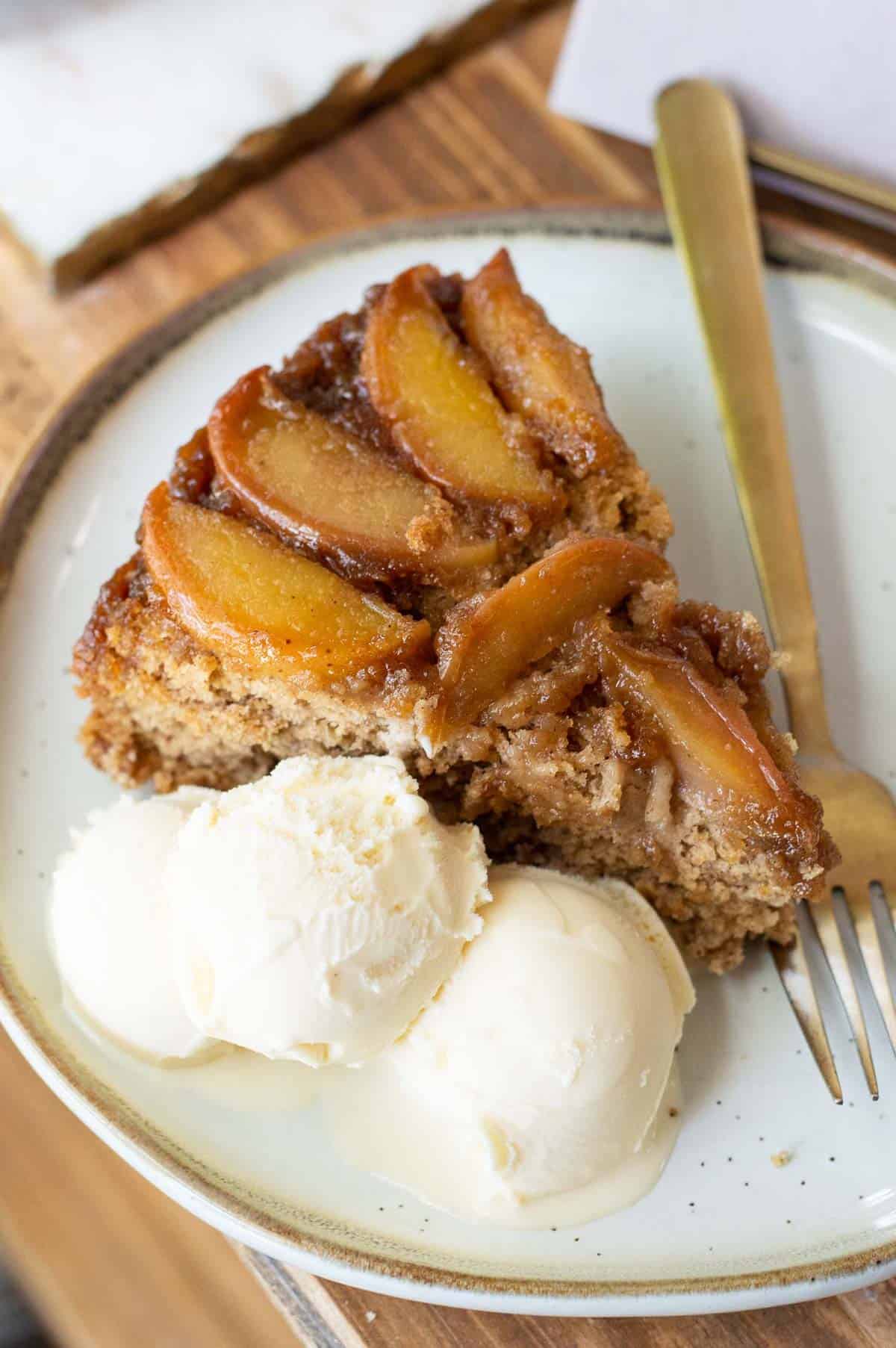 Gluten free apple cake on a white cake stand