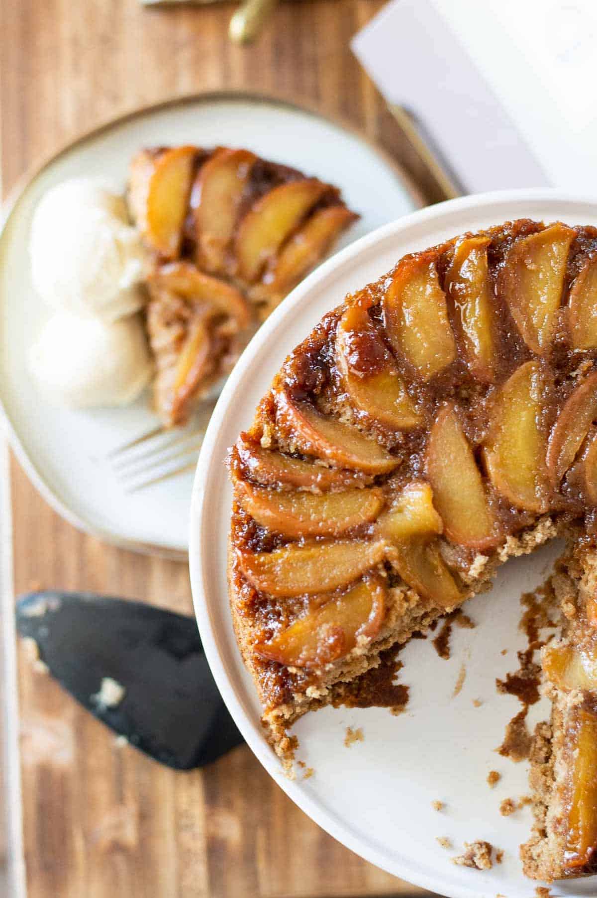 Gluten free apple cake on a white cake stand