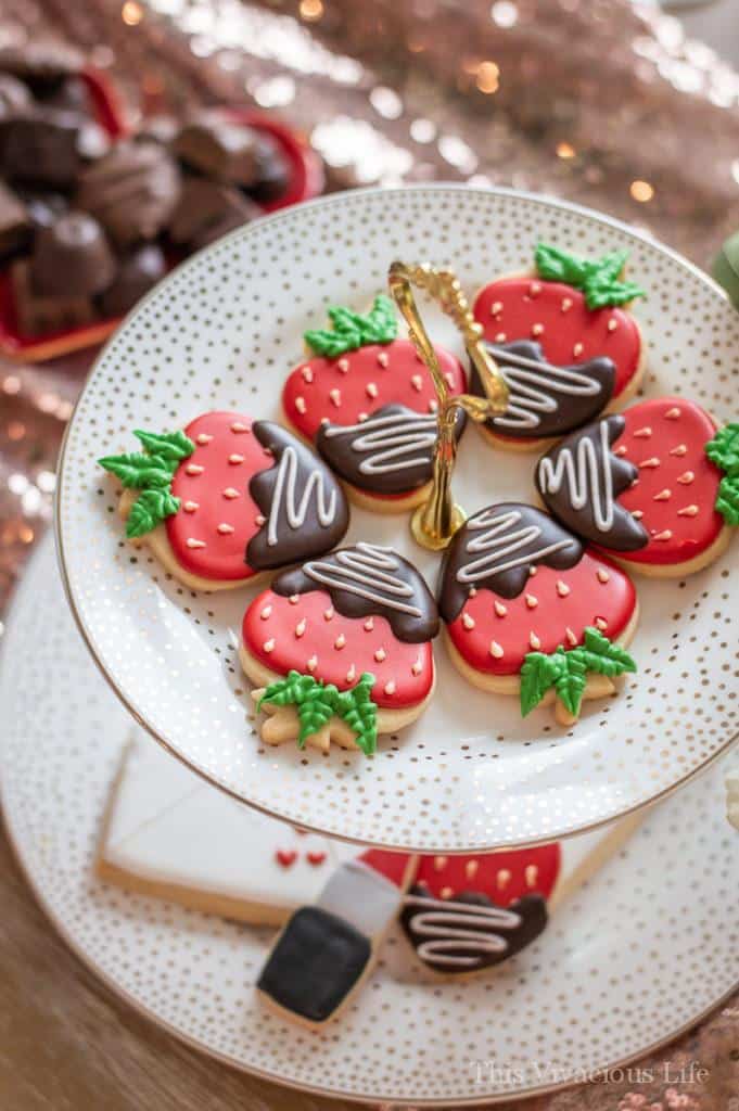 Chocolate dipped strawberry cookies on a tray