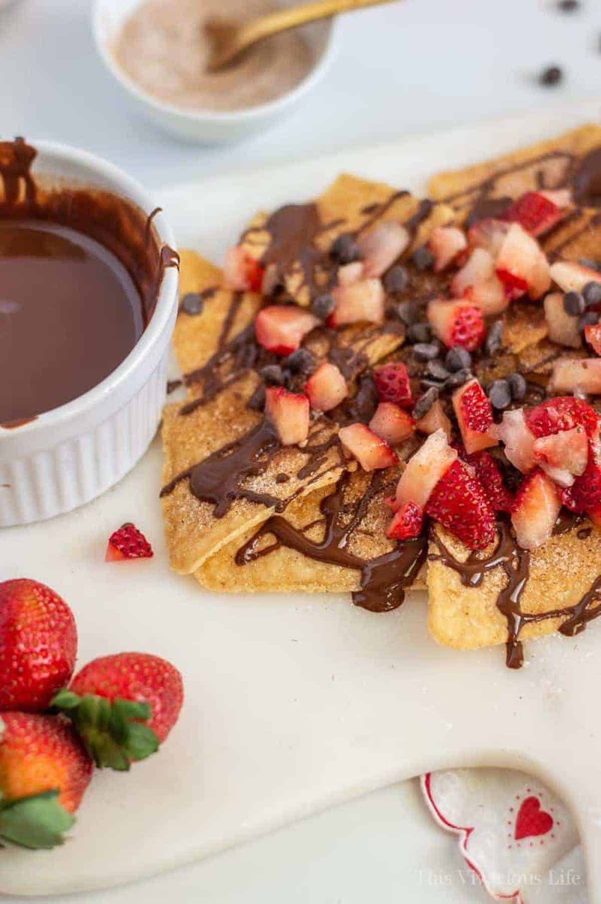 Up close of the dessert nachos with vegan chocolate sauce