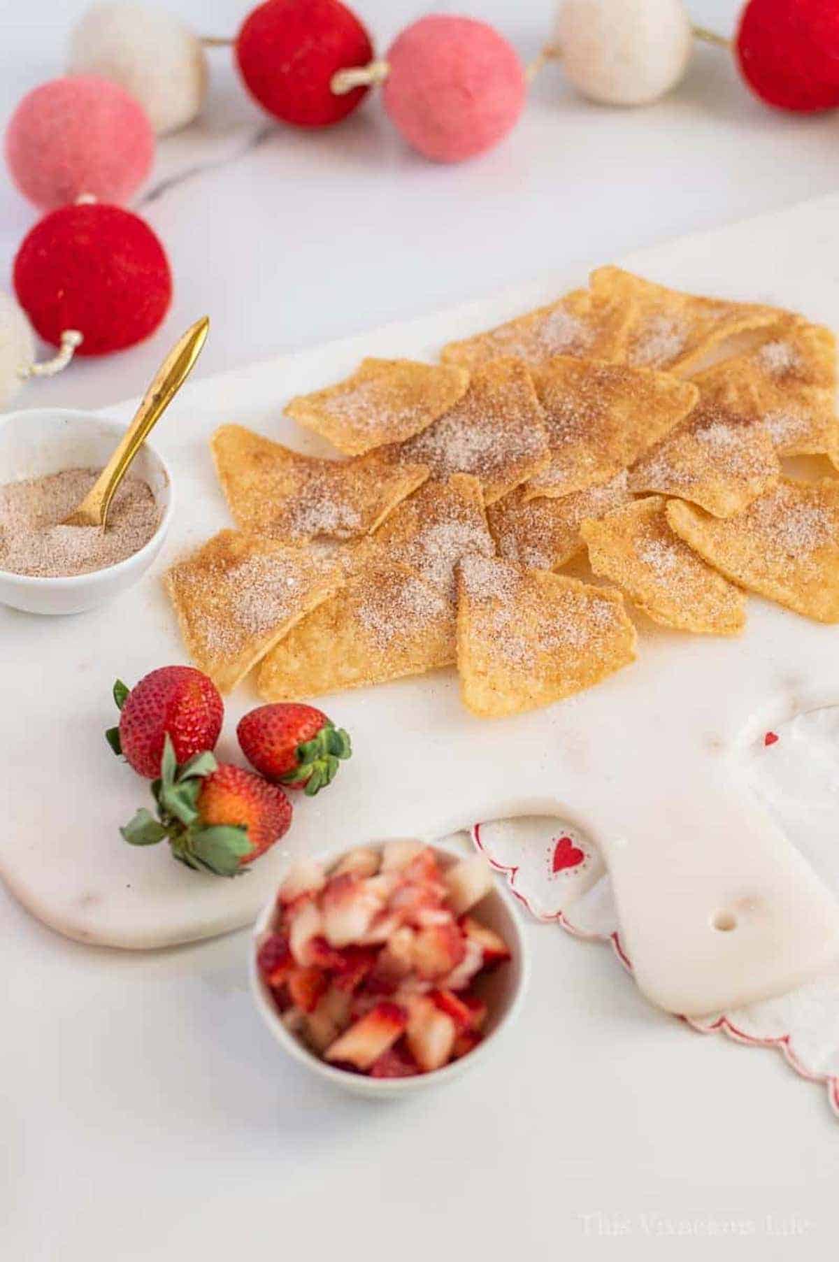 Cinnamon sugar chips on a marble platter
