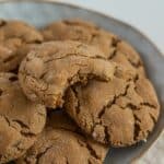 chewy gluten-free molasses cookies with ginger on a plate