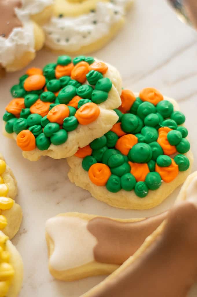 Peas and carrots decorated sugar cookies