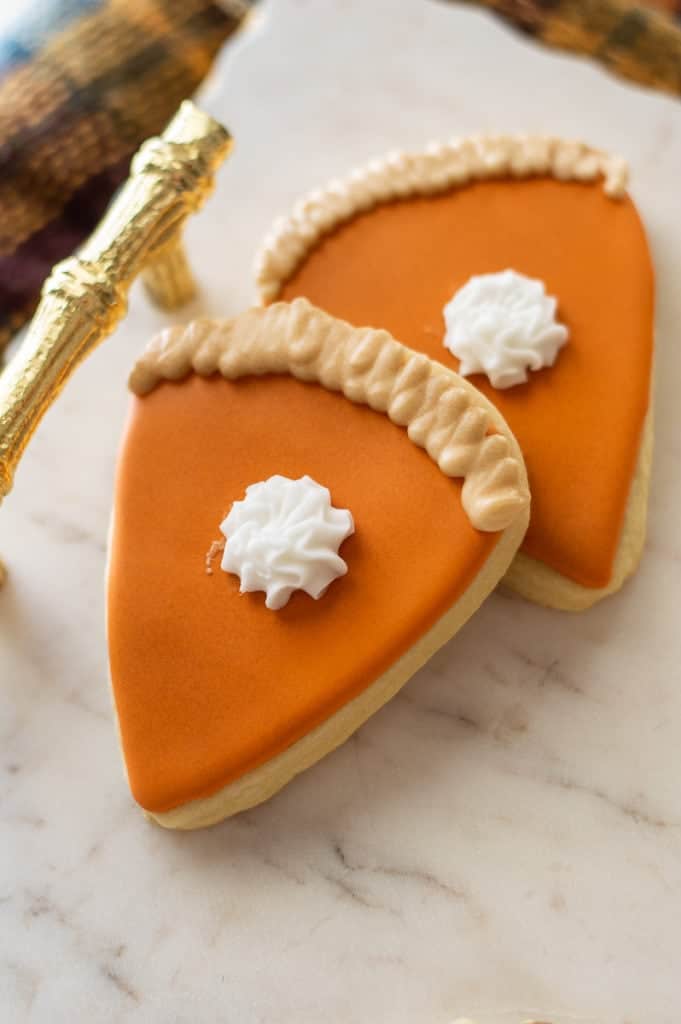 Pumpkin pie sugar cookies on a marble platter
