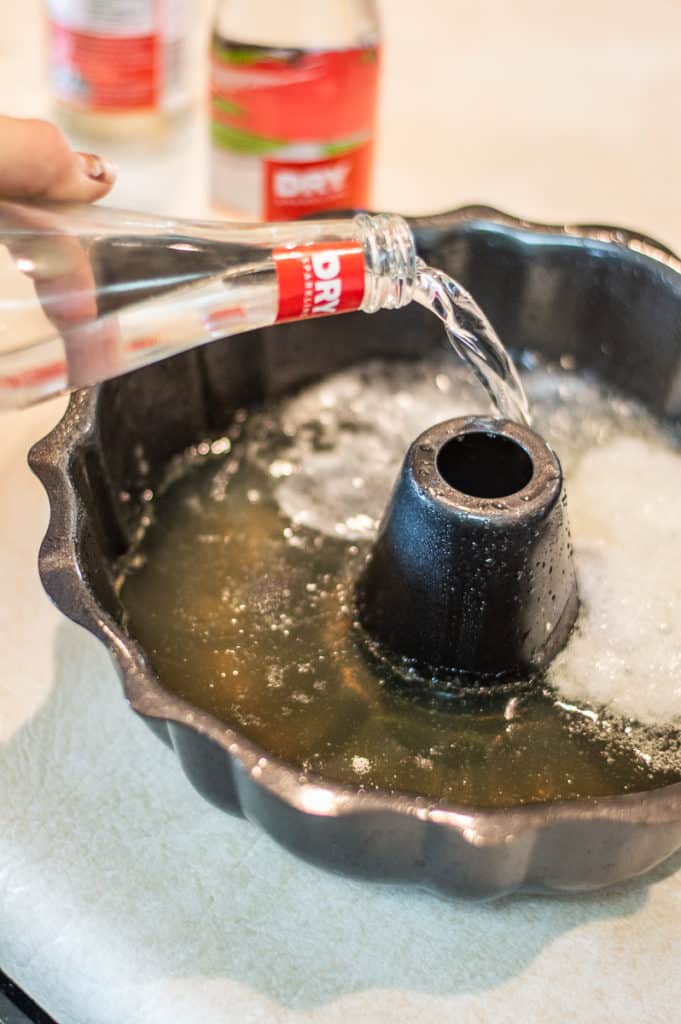 Sparkling soda poured into a bundt pan