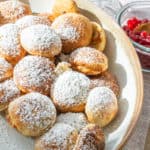 Ebelskivers recipe in a big bowl with powdered sugar
