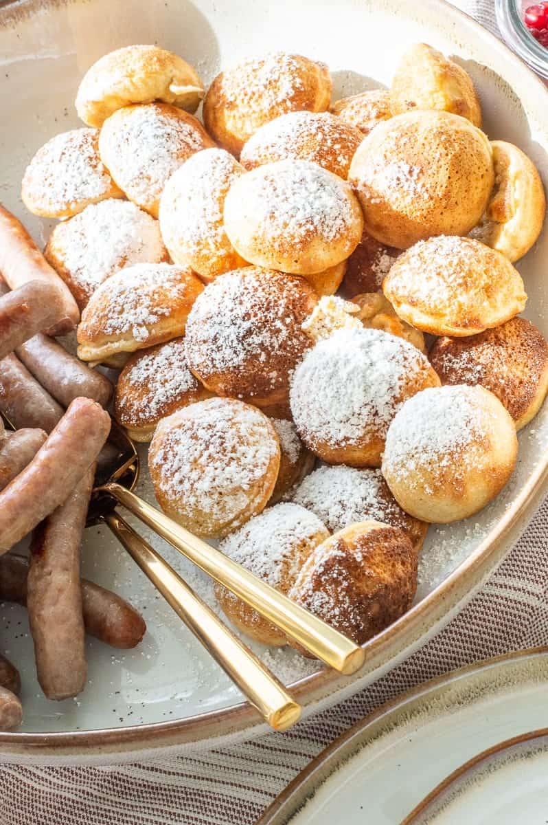 Ebelskiver recipe with powdered sugar in a big bowl