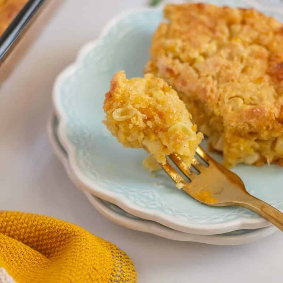 Gluten free corn casserole on a fork and plate