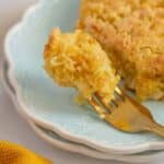 Gluten free corn casserole on a fork and plate